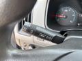 Close-up of a 2017 Chevrolet Colorado turn signal lever featuring buttons for setting and clearing along with a menu option