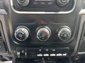 The dashboard controls of a 2016 RAM 5500 with knobs for air conditioning heating and various settings