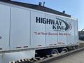 A 2023 Wabash International trailer with the logo of Highway King Transport Ltd and the slogan Let Your Success Ride With Us displayed prominently on the side