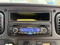 A Panasonic MP3 car stereo with an adjustable display and various buttons for tuning and settings