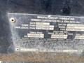 A metal identification plate from a 2010 Vermeer Corporation BC1200XL showing manufacturing details specifications and compliance information