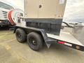 A 2005 Katolight SED60FPJ4 generator on a trailer with dual wheels and a hose reel mounted on the side