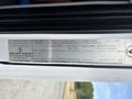 A vehicle specifications label for a 2020 Lion Lion6 including details like vehicle identification number, weight limits, and tire sizes