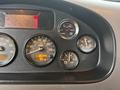 Dashboard of a 2020 Peterbilt 330 displaying various gauges including speedometer odometer and voltmeter