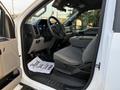 Interior view of a 2018 Ford F-350 showing the driver's seat steering wheel and dashboard