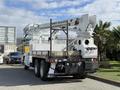 A 2008 Kenworth T370 bucket truck with a Terex Telelect aerial lift attached, featuring a flatbed and visible tools on the rear of the vehicle