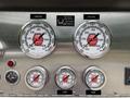 Control panel with gauges for compound and pressure readings featuring dials for VAC and KPA along with a temperature gauge and indicators for foam and pump engagement