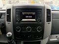 Dashboard of a 2017 Mercedes-Benz Sprinter featuring a central display screen with audio controls and climate dials