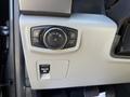 The image shows the interior controls of a 2018 Ford F-150 including the headlight switch and a pull switch for fog lights