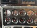 Dashboard of a 2018 Kenworth T800 featuring various gauges including speedometer fuel gauge and air pressure indicators