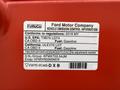 2019 Ford F-150 with a vehicle emission control information label displaying fuel type and regulatory details