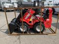 A red 2025 AGT Industrial SDA-140WZ compact loader with black bucket and four wheels inside a wooden frame