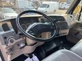 Interior view of a 2006 Sterling Acterra featuring a steering wheel dashboard gauges and gear shift