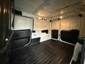 Interior view of a 2017 RAM ProMaster City cargo van showing spacious empty cargo area with rubber flooring and interior lights