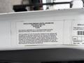 Label providing vehicle noise emission control information for a 2020 International MV607 truck built by Navistar
