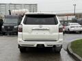 A white 2018 Toyota 4Runner seen from the rear with a clean design and distinctive taillights