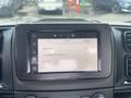 Dashboard screen of a 2023 RAM Promaster 3500 displaying options for trip controls settings and language preferences