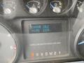 Dashboard display of a 2015 Ford F-550 showing engine idle hours at 2223 and fuel type as ultra low sulfur diesel fuel only
