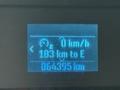 Display panel showing speed as 0 km/h fuel range as 183 km to empty and total distance traveled as 064395 km on a 2022 Ford E-450