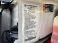 A 2020 Chevrolet Silverado engine displaying an International engine information label with specifications and details