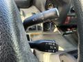 The image shows the steering column controls of a 2014 Hino 195 including various levers for cruise control and turn signals