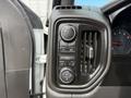 The image shows the control panel of a 2019 Chevrolet Silverado 1500 featuring climate controls and a dial for various drive modes