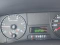 Dashboard of a 2005 Ford F-350 SD showing gauges for RPMs and turbo PSI along with an odometer reading of 9530 miles