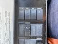 Control panel with various buttons labeled LT TEST ECAS II HVAC WASHER DRIVER FAN and FAST IDLE