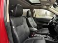 Interior of a 2016 Mitsubishi Outlander featuring two black leather front seats and a central console area