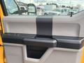 Interior door handle of a 2017 Ford F-250 SD with a sleek design and a combination of gray and black materials
