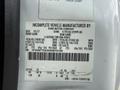 2017 Ford F-750 truck with a vehicle information label detailing weight limits tire specifications and production information