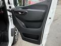 2019 Mercedes-Benz Sprinter door panel featuring a black plastic design and handle