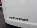 White 2022 GMC Savana van displaying the SAVANA logo above raindrops on the rear panel
