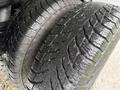 Tires of a 2013 Chevrolet Silverado 3500HD showcasing deep tread patterns designed for traction and stability