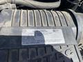 A vehicle emission control information label affixed to the engine compartment of a 2020 Chevrolet Express