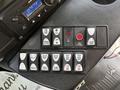 Control panel of a 2020 Chevrolet Express with buttons for lights mirrors and various functions