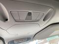 The interior ceiling of a 2017 Ford Transit Connect featuring overhead vents and controls