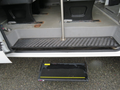 2009 Dodge Sprinter Van with visible step platform and interior seating area showing floor space and seating configurations