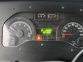 Dashboard of a 2012 Ford Econoline displaying speedometer tachometer fuel gauge and odometer with indicators for park reverse neutral and drive