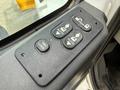 Control panel for a 2016 International 7600 featuring buttons for door and window controls including lock and auto functions