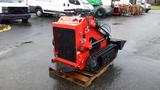 A red 2023 AGT Industrial machine with tracks and a large front attachment sits on a wooden pallet