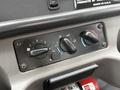 Control panel of a 2019 Freightliner M2 featuring knobs for temperature and airflow settings