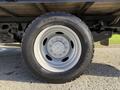 Close-up of a tire on a 2020 Ford F-550 featuring a silver rim and black tread with the brand name visible on the sidewall