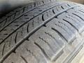 Close-up of a tread pattern on a tire from a 2018 Toyota Highlander showing detailed grooves and wear indicators