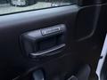 Close-up of the door handle of a 2017 GMC Sierra 3500HD featuring a sleek design with buttons for locking and unlocking the door