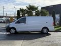 A 2020 Mercedes-Benz Metris van in white positioned sideways with a clean design and sliding side door
