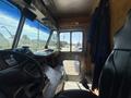 Interior view of a 2009 Workhorse W62 with a driver's seat dashboard and controls visible from the driver's perspective