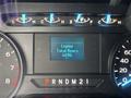 Dashboard of a 2020 Ford F-150 displaying engine information with total hours reading 4496 and illuminated indicators for various functions