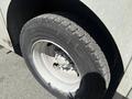 Close-up of a tire from a 2009 Workhorse W62 showing tread pattern and wheel design
