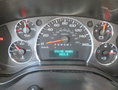 Dashboard of a 2020 Chevrolet Express showing speedometer and gauges for fuel engine temperature and engine hours with digital readout displaying 9823.5 hours